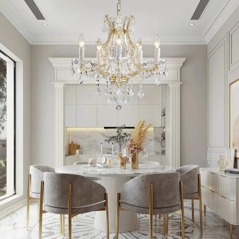Gold 5 Light Maria Theresa Crystal Chandelier With Adjustable Chain Up To 52 Inches E12 Bulb Ready in elegant dining room setting.