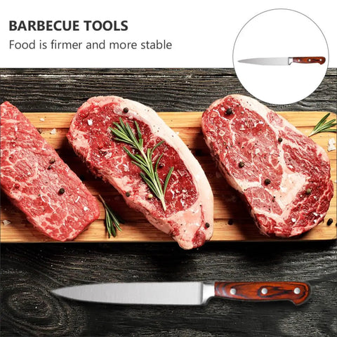 Stainless Steel Barbecue Tool Set With Grilling Fork And Cutter Wood Handle Outdoor BBQ Utensils shown with raw steaks on board