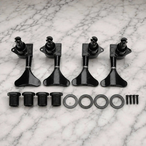 Get Your Bass Guitars Tuned Smooth As Butter With This 4 Piece Set Of Black Metal Tuning Machines Featuring Closed Gear Housing Rust Resistant Finish And Super Easy Adjustment Perfect For Rehearsals Home Studios Or Just Quick On The Spot Tune Ups Without. Black metal tuning pegs set with washers and screws.