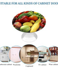 Top Shelf Antique Stainless Steel Cabinet Knobs 2 Piece Set Rock Solid round drawer pulls on a cabinet display with fruits.