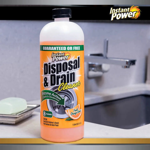 Disposer And Drain Cleaner With Enzyme Power For Odor Busting Orange Scent 1 Liter bottle on kitchen counter.