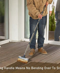 Person using Long Handle Deck Stain Brush Applicator With 7 Inch Wide Brush For Stains Paints And Sealer On Outdoor Wood Deck