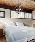 Cozy Rustic Farmhouse 4 Light Chandelier With Height Adjustable Design in bedroom, wood frame and vintage white finish