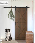 Installed 6 Ft Heavy Duty Sliding Barn Door Hardware Kit with Track Rail, quiet smooth operation, and adjustable floor guide.