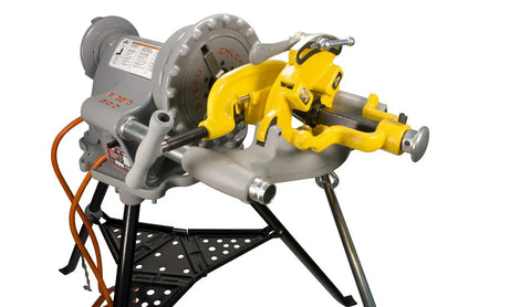 Reconditioned Model 300 Pipe Threader With Foot Pedal Control And Universal Quick Swap Die Heads heavy duty setup for pipe threading.