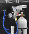 VEVOR double-gauge CO2 regulator with blue hose connected to a gas cylinder for draft beer system