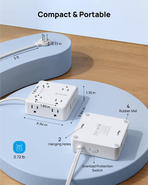 Hella Spaced Surge Protector Power Strip With Flat Plug Extension Cord And 5 Foot Cord features 8 AC outlets and 4 USB ports on a light blue surface.