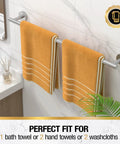 Brushed Nickel 24 Inch Towel Bar Wall Mounted Stainless Steel Bath Rack with two orange towels in bathroom setting