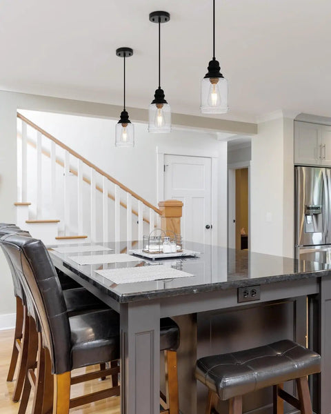 Slick Five Point Five Inch Seeded Glass Mini Pendant Light Featuring Badass Black Metal Hanging Fixtures For Kitchen Island And Dining Room above gray kitchen island.