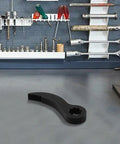 Pry Bar Wrench Adaptor Head For Half Inch Drive Crowbar Adapter in a workshop setting with visible tools.