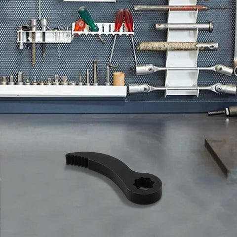 Pry Bar Wrench Adaptor Head For Half Inch Drive Crowbar Adapter in a workshop setting with visible tools.