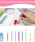 Hand using slotted pen from All In One 9 Piece Slotted Quilling Tool Set For Beginners To Pros, crafting red paper coils on design.