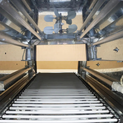 Inside view of the Heavy Hitter Industrial Heat Shrink Tunnel with chain conveyor and digital temp control 220V.