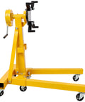 Heavy Duty Folding Engine Stand With Geared Rotating Head And 360 Degree Swivel Casters 1500 Lb Capacity side view with yellow steel frame.