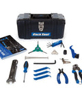 Home Mechanic Bicycle Repair Starter Kit with 15 essential tools, Big Blue Book of Bicycle Repair, and custom tool box for maintenance.