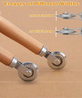 Pro Grade Dual Size Box Resizer Tool Set with 0.5mm and 1.2mm CAMs, showing dual creasing wheels on cardboard surface