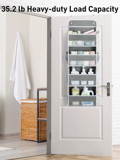 Over The Door Organizer With Four Bins And Six Mesh Pockets Swing Proof Hanging Storage For Nursery And Baby Essentials Toys And Stuffed Animals Perfect For Dorm Rooms And Bathrooms 42 Inches Tall hanging on a door filled with toiletries and cleaning supplies in a bathroom.