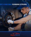 Mechanic installing Front Wheel Hub Bearing Assembly 513179 Compatible with Cadillac Seville on vehicle axle