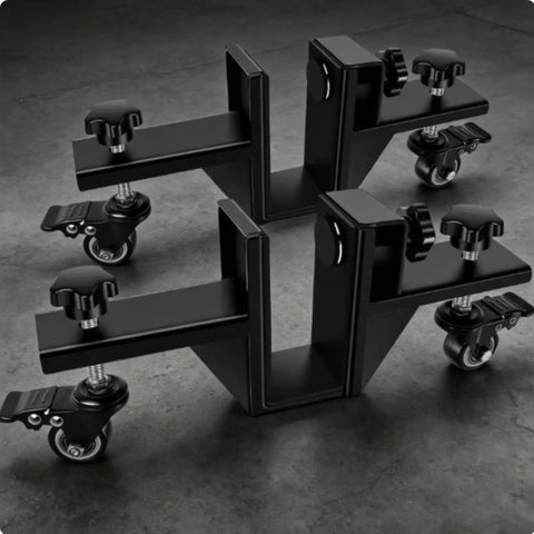 Game Changer Door Panel Mover With Rock Solid Adjustable Clamps And Smooth Glide Swivel Casters on a dark surface.