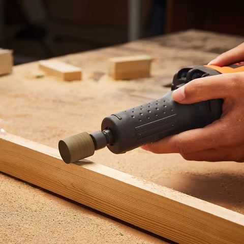 Heavy Duty Workhorse Die Grinder With Variable Speed 7000 To 30000 Rpm in use against wood, showcasing rust removal and grinding.