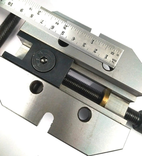 Heavy Duty Two And Three Eighths Inch Jaw Width Grinding Steel Vice With Hardened Ground Finish For Precision Milling And Toolroom Use Providing Vibration Free Clamping And Stable Workholding, angled top view with slotted base