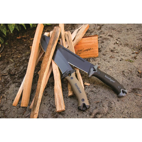 Camp 10 Machete 10 Inch Recurve Fixed Blade, Full Tang, 65Mn Carbon Tool Steel, Tan Handle, shown with wood for yard work
