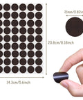 Top Notch 108 Piece Self Adhesive Screw Hole Plugs 20Mm Black Walnut Wood Grain Finish For Furniture Cabinet Wardrobe Desk Decorative Hidden Cap Covers No Sweat Setup, 21mm round sizes displayed.