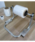 Heavy Duty All Metal Roll Holder And Dispenser For Bubble Wrap And Stretch Film With Weighted Stable Base for efficient packing.