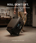 Person rolling Guardian 6000 V2 Portable Power Station 120V 240V Dual Voltage, 6000W Continuous Output, on wheels