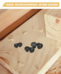Eight Piece Black Woodworking Dowel Transfer Plugs And Centering Pins Set For Furniture Joinery on wood surface