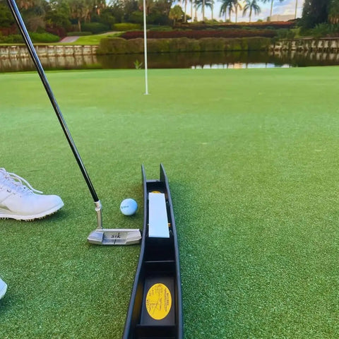 Golfer using MS3D Model Golf Putting Arc Training Aid for a Perfect Stroke and Lower Scores on a green. Midnight Black finish.