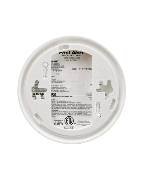 Back view of Battery Powered Carbon Monoxide Alarm With Wireless Interconnection And Voice And Location Alerts, showing label details.