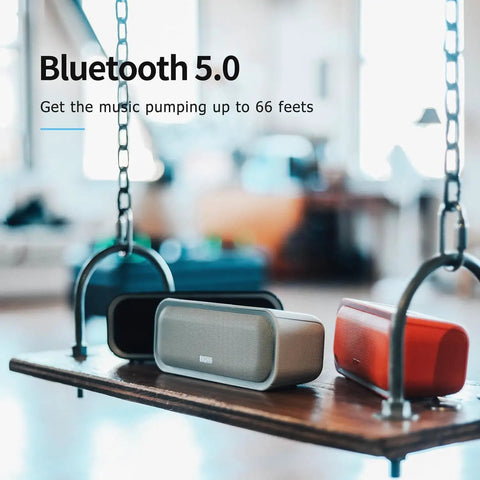 Bluetooth 5.0 speakers in black, grey, and red on swing, showcasing 20W Bluetooth Speaker With Deep Bass And Stereo Sound 20 Hour Playtime