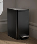 Black Stainless Small Trash Can With Foot Pedal And Quiet Close Lid 1.6 Gallon 6 Liter Fingerprint Resistant against wall