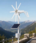 2000W Wind Turbine Generator Kit for 24V Home, RV, and Boat Use with 8 Blade Three Phase AC System in mountain setting