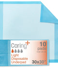 Zero Drama Disposable Underpads 30 x 30 Inch 50 Count Light Absorbency Bed Pads With Quilted Top Sheet shown on surface.