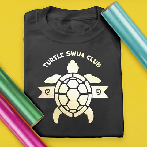 Electric Pearl Heat Transfer Vinyl Roll, 11.8 Inches By 3 Feet, Siser EasyWeed HTV next to a Turtle Swim Club shirt on yellow background.