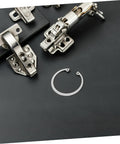 5 Piece Stainless Steel C Clip Retaining Ring Set for Pins, Shafts, and Studs displayed on black surface with metal hardware
