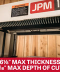 Close-up of warning label and maximum settings on Heavy Duty 13 Inch Planer And Molder Combo For Woodworking.