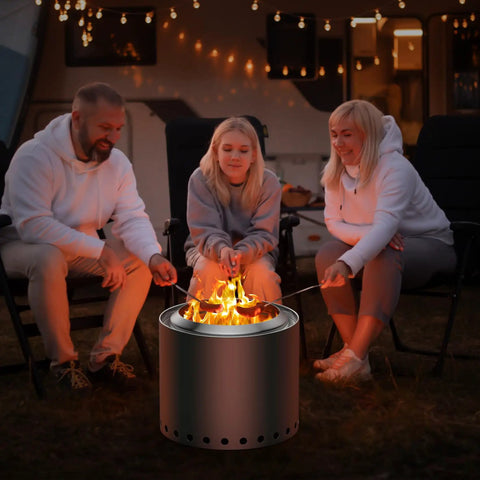 Three people sitting around a bonfire with a Pellet Adapter for Bonfire Fire Pit, Stainless Steel Dual Fuel Accessory, 17.3 Inch Extension.
