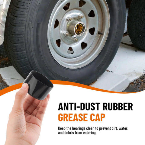 Black rubber grease cap held by hand beside a steel trailer wheel with exposed hub bearing