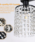 Close-up of Black Four Light Crystal Vanity Light Fixture 31.5 Inch Over Mirror for Bathroom with crystal droplets detail
