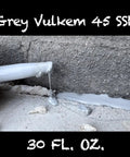 Heavy Duty Grey Semi Self Leveling Sealant Two Pack applied on concrete surface, showcasing smooth, flexible finish.