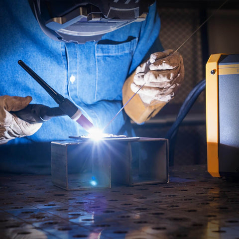 Welder using 3/32 Inch By 7 Inch Red EWTh-2 TIG Tungsten Electrodes for precision welding