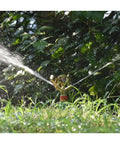 Tough As Nails Zinc Alloy Pulsating Sprinkler With 360 Degree Rotation watering lawn under trees