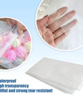 Close-up of Huge Balloon Storage Bags Pack Of Four Transparent Giant Bags 59 By 98 Inches And 47 By 59 Inches, showing waterproof, tear-resistant material.