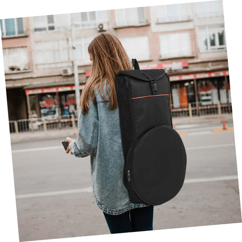 Heavy Duty 12 Inch Practice Pad Backpack That Stays Totes Waterproof And Shields All Your Drum Gear Securely For Gig Ready Jam Sessions While Keeping Your Setup Sweet And Road Trip Safe, seen on a young woman in a city.