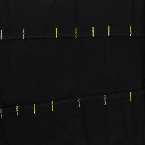 Close-up of Multi Functional Chef Knife Roll Bag With Pockets and Handle showing black fabric and yellow stitching.