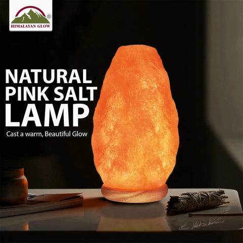 Himalayan Glow Natural Pink Salt Lamp Hand Mined In The Himalayan Mountains Crystal Night Light With ETL Brightness Dimmer Switch Wooden Base 6 To 8 Lbs Salt Lamp Calming Amber Glow Gift Box Included glowing on tabletop