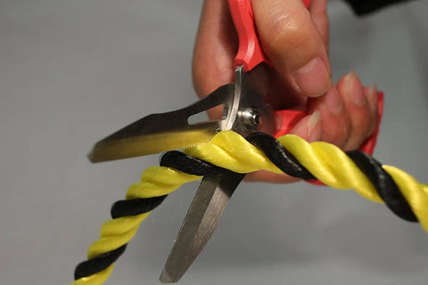 Cutting yellow and black twisted cord with pliers from 5 Piece Screw Extractor Pliers Set With 5, 6.25, 7, And 8 Inch Pliers, Slip Joint